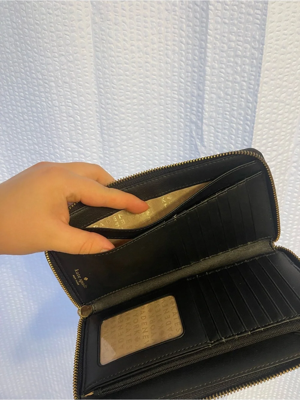 38. Large Kate Spade wallet wristlet.